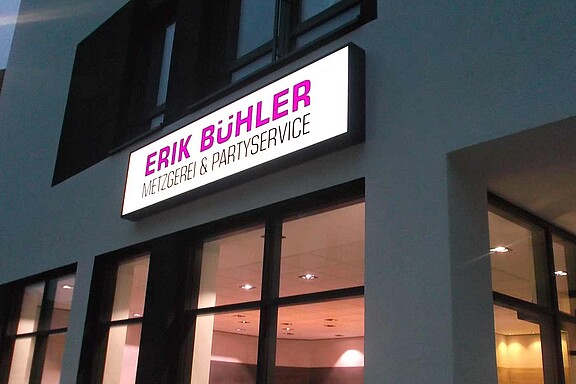 Leuchtkasten Erik Buehler