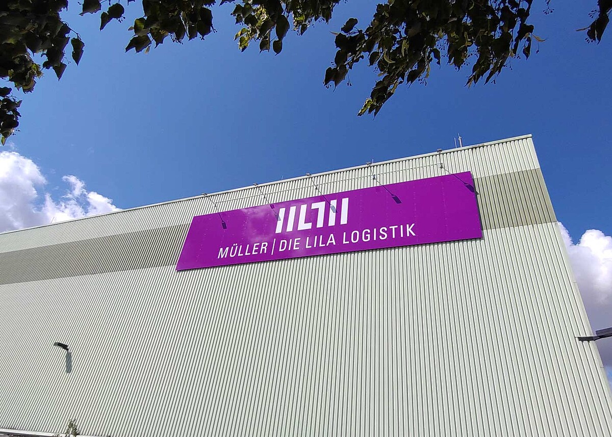 Werbeschild Lila Logistik